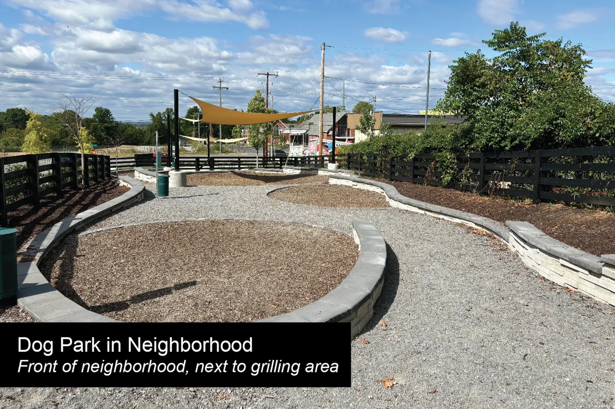 A welcoming outdoor communal space featuring a dog park area, grilling zone, and shade structure. Families and pets can be seen enjoying the friendly, landscaped environment, highlighting the community’s pet-friendly and social atmosphere.